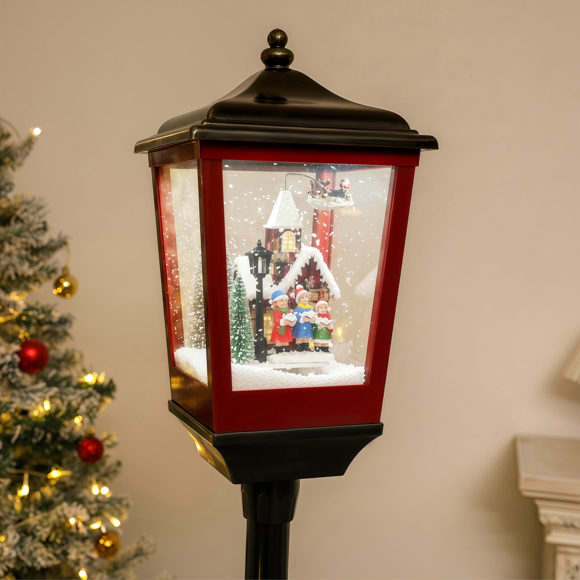 base and snowy top of black festive lamp post