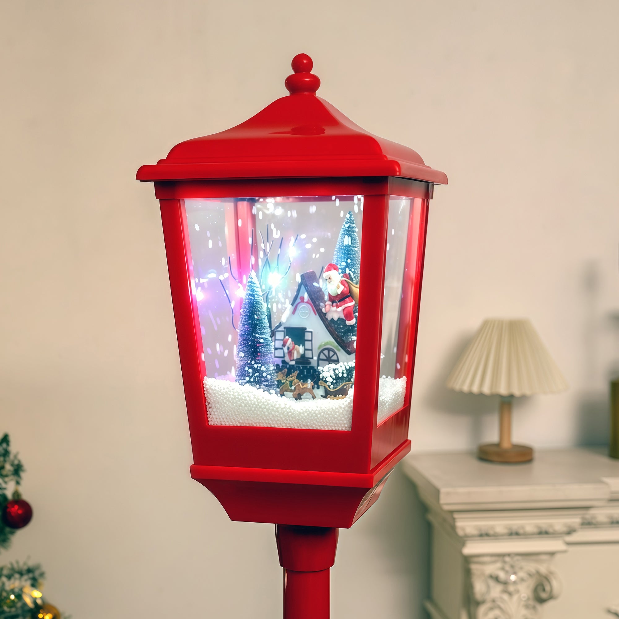 red base and snowy top detail of LED lamp post